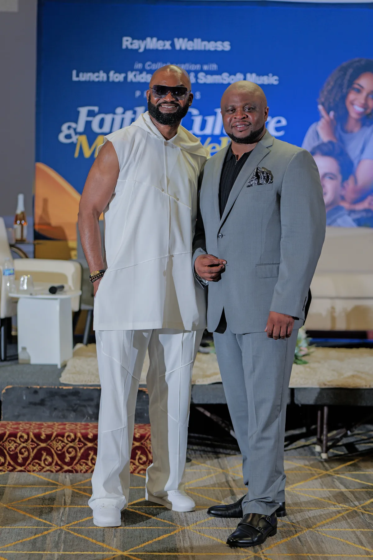 Nnemeka Okpala with a SamSoft Music performer at the community health experience