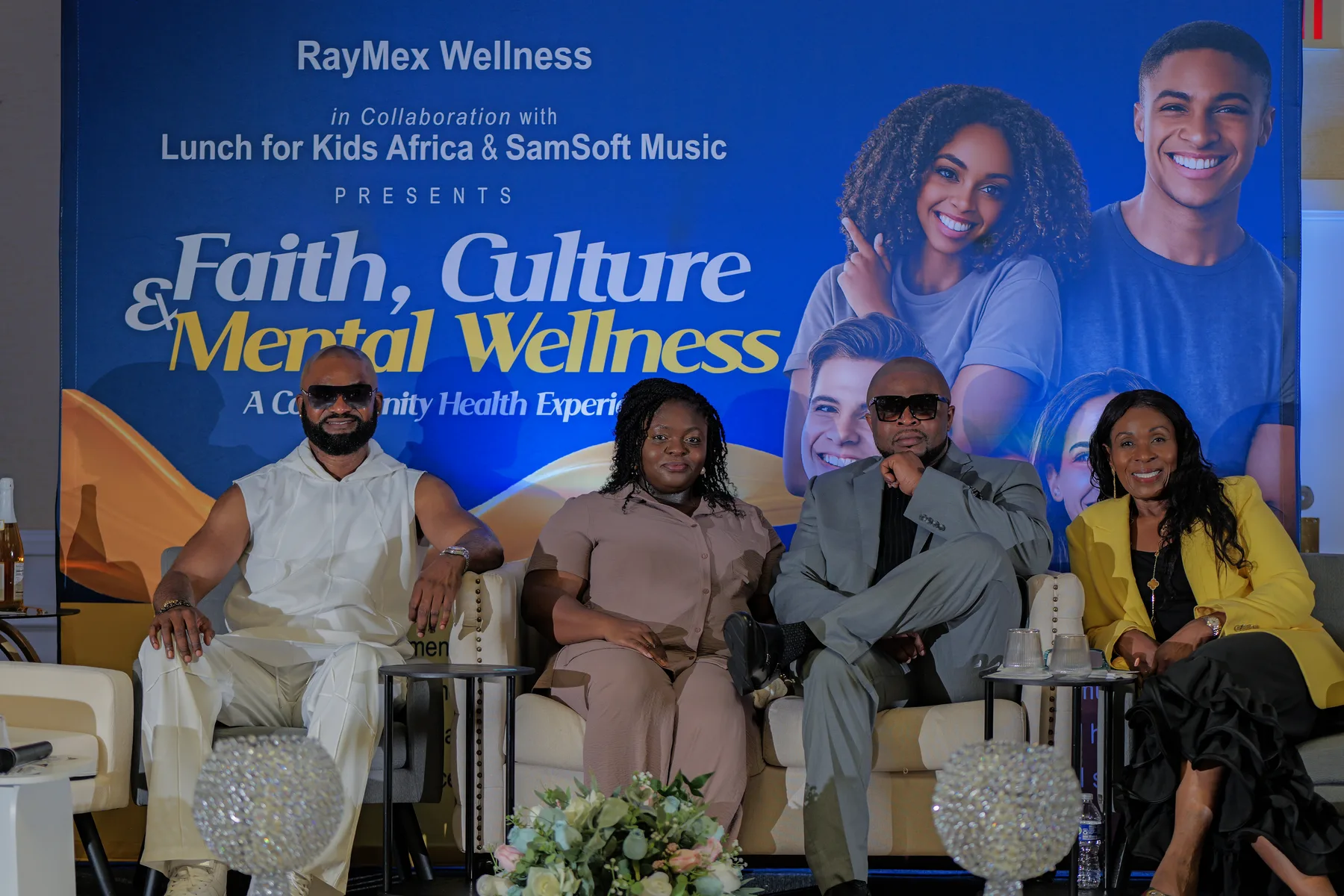 Event organizers and community partners seated on a panel at the Faith, Culture & Mental Wellness community health experience